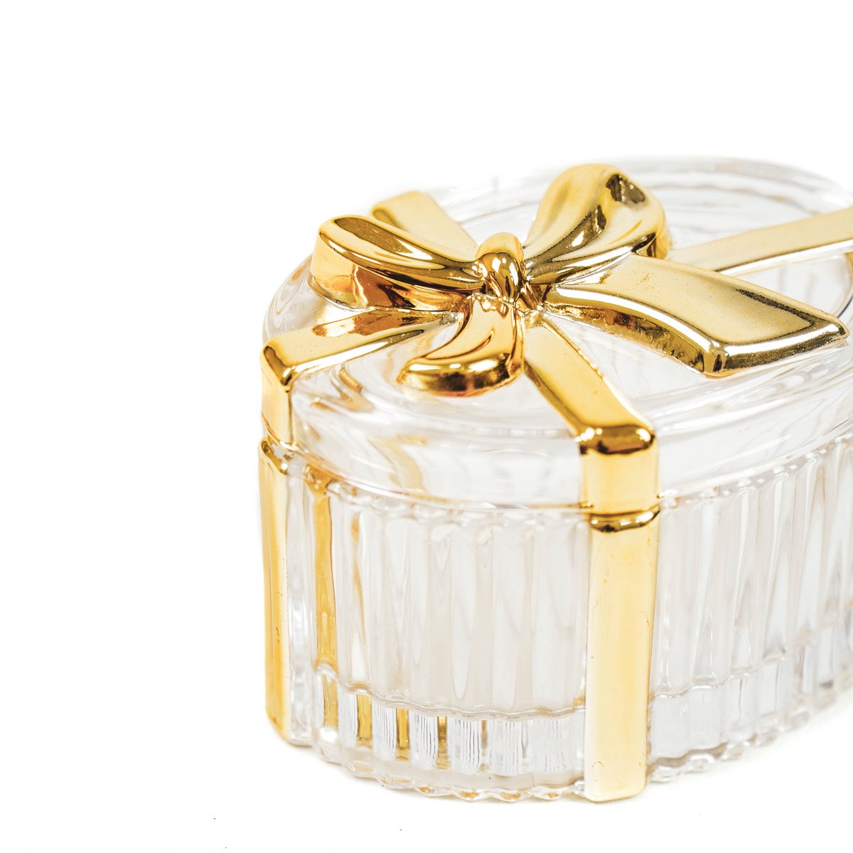Glass box with golden ribbon